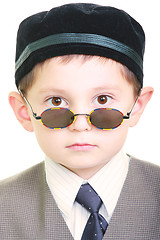 Image showing Serious kid in sunglasses