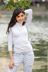 Image showing Brunette in casual at pond