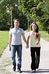 Image showing Couple walking in park