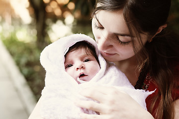 Image showing Mother looking at child