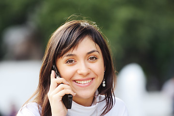 Image showing Brunette with phone