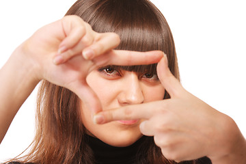 Image showing Intent gaze through finger frame