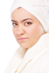 Image showing Serious woman in bathrobe sideview