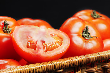 Image showing Slit tomato in basket closeup