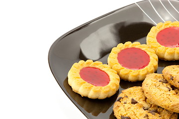 Image showing cookies on plate isolated on white backgrounds