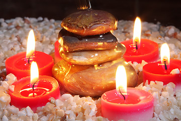 Image showing Cairn surrounded by candles