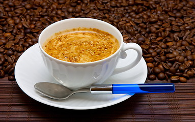 Image showing Coffee cup and grain