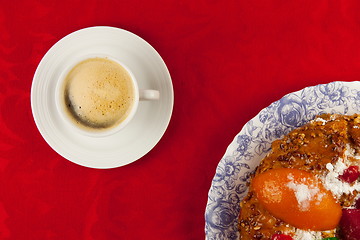 Image showing white cup of coffee  on red background