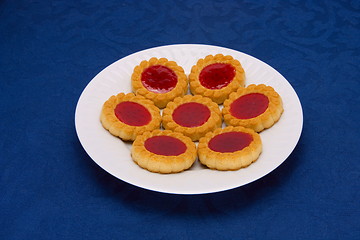 Image showing cookies on a Plate on a blue background