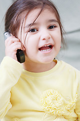 Image showing Little girl on phone