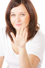 Image showing Brunette gesturing stop