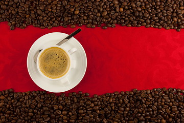 Image showing coffee cup from above with coffee beans