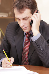 Image showing Businessman at phone conversation