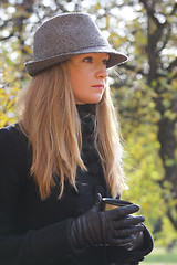 Image showing Serious blonde in hat