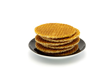 Image showing cookies on plate isolated on white background