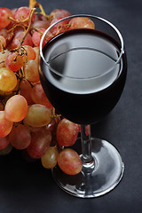 Image showing Red wine and grapes