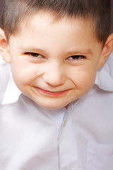 Image showing Smiling boy in white shirt