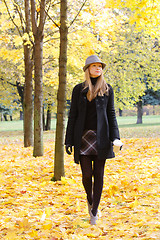 Image showing Woman walking in park