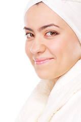 Image showing Smiling woman in bathrobe sideview