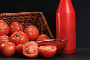 Image showing Spread tomatoes and ketchup