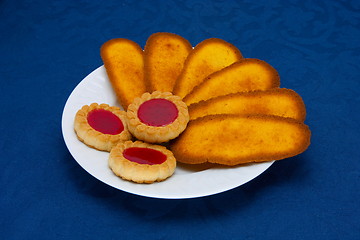 Image showing cookies on a Plate on a blue background 