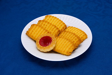 Image showing cookies on a Plate on a blue background