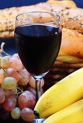 Image showing Red wine bananas and grape