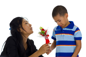 Image showing small boy apologising to his mother