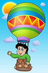 Image showing Boy in balloon on sky