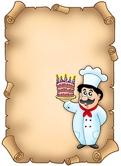 Image showing Parchment with chef holding cake