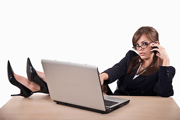 Image showing Young attractive caucasian twenties businesswoman with laptop