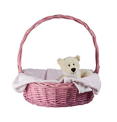 Image showing Teddy bear in a pink basket