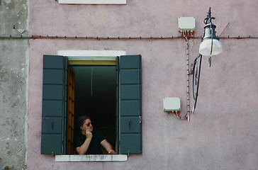 Image showing Man in window