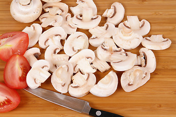 Image showing mushrooms on chopping board