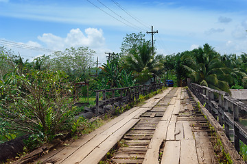 Image showing Crumbling tropical bridge