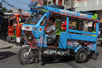 Image showing Southeast-Asian motorela on street
