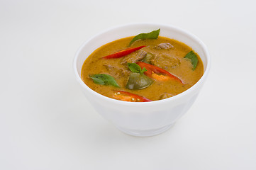 Image showing red curry in a white bowl