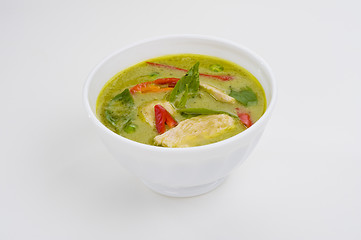 Image showing green curry in a white bowl