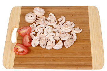 Image showing mushrooms on chopping board 