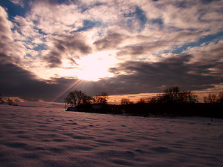 Image showing Sunset over winter field