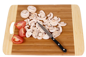 Image showing mushrooms on chopping board