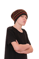 Image showing The teenager in a black vest and a hat