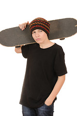 Image showing The teenager with a skateboard 