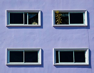 Image showing Windows on the purple wall.