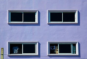 Image showing Windows on the purple wall.