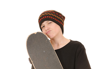 Image showing The teenager with a skateboard 