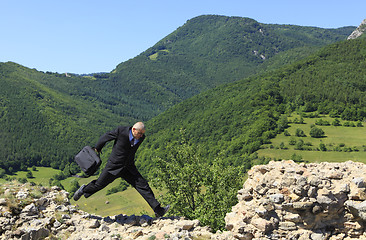 Image showing Businessman running