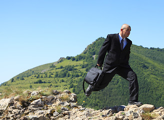 Image showing Businessman running