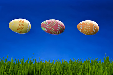 Image showing UFO Easter eggs in flight