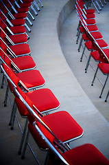 Image showing Perfect rows of red chairs